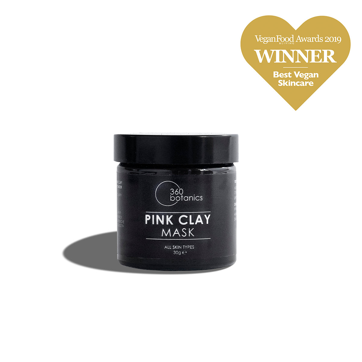 360 Botanics Pink Clay Mask in a sleek black jar against a white background, labeled for all skin types. The product has been awarded the 'Vegan Food Awards 2019 WINNER Best Vegan Skincare', which is highlighted by a golden heart-shaped badge at the top, signifying its quality and vegan-friendly formulation