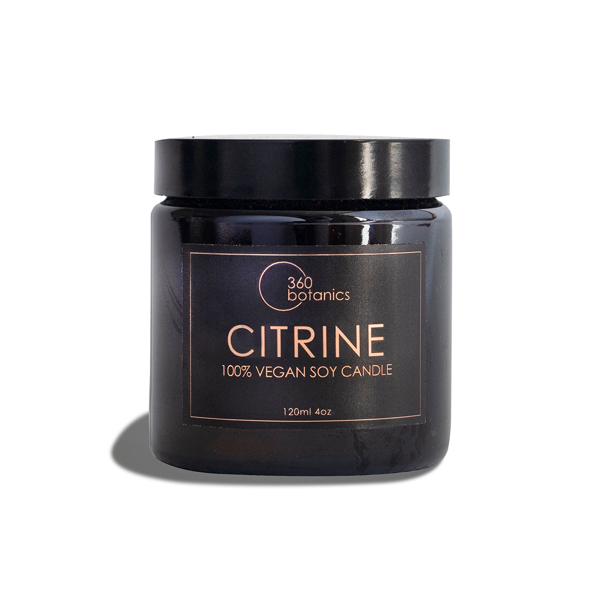 An unlit 360 Botanics Citrine 100% vegan soy candle in a black glass jar, labeled with a capacity of 120ml or 4oz, against a bright white background.
