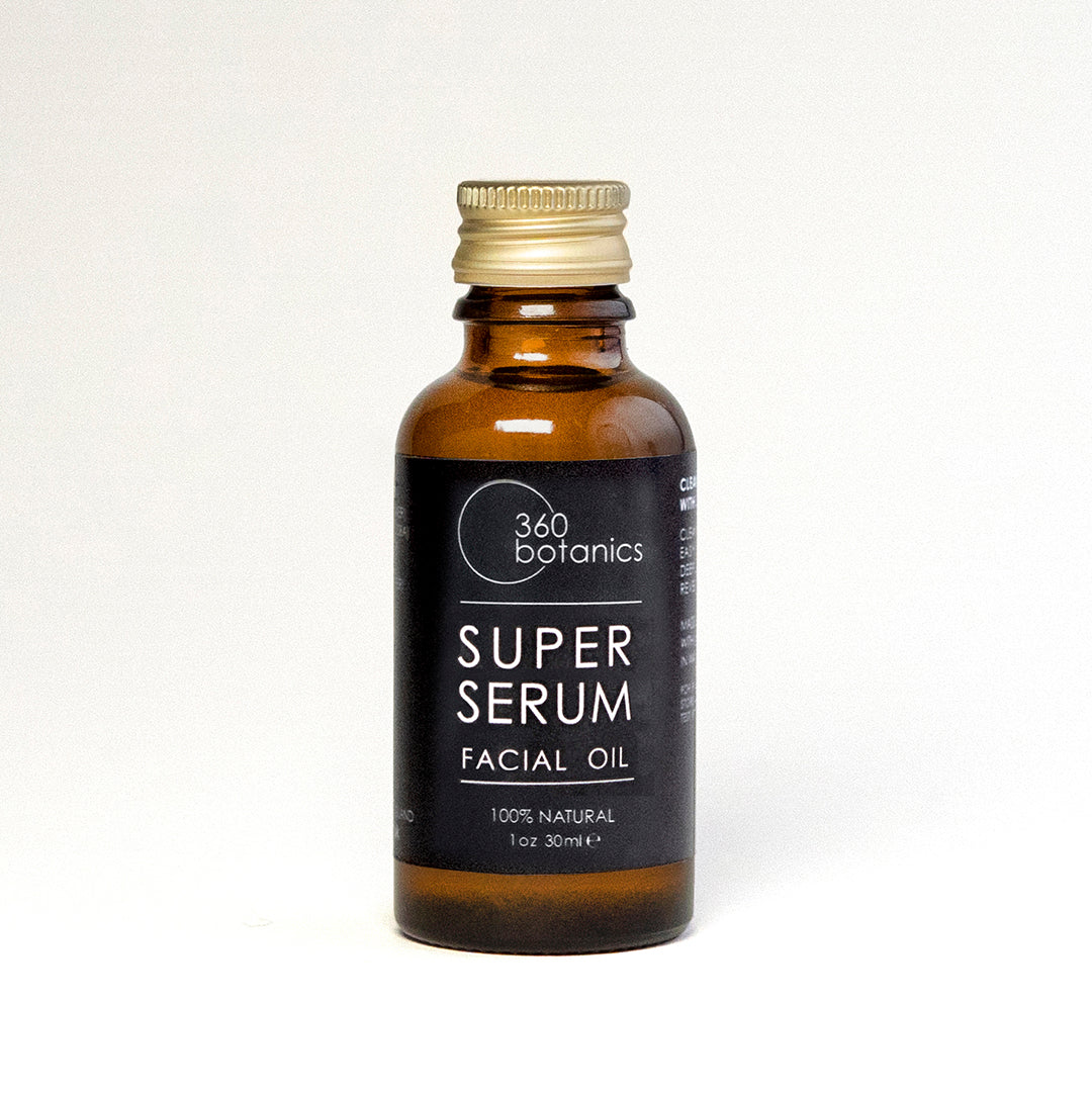 A close-up image of the 360 Botanics Super Serum Facial Oil refill bottle in eco-friendly amber glass, showcasing the product's elegant minimalist design and natural skincare focus