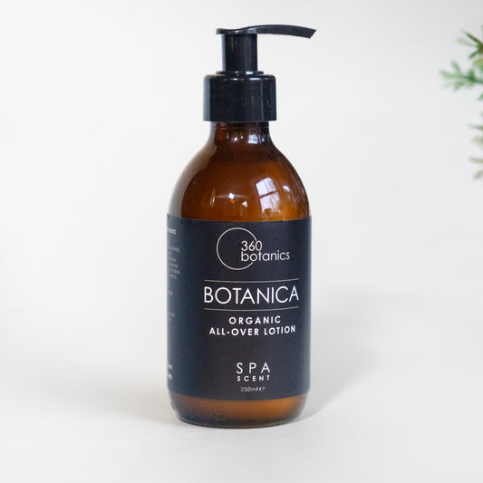 360 Botanics Botanica Organic All-Over Lotion in an amber bottle with a pump dispenser, featuring a sleek black label, displayed on a white background