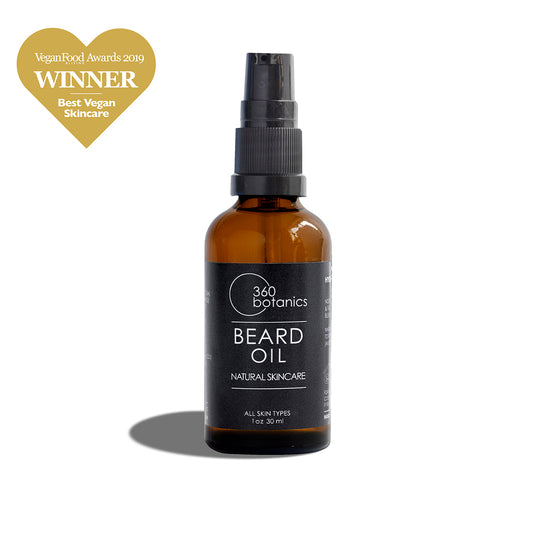 A bottle of 360 Botanics Beard Oil labeled "Natural Skincare" for "All Skin Types" in a 1 oz 30 ml size, with a spray nozzle, in front of a white background. Above the bottle, a badge stating "Vegan Food Awards 2019 WINNER Best Vegan Skincare" is prominently displayed.